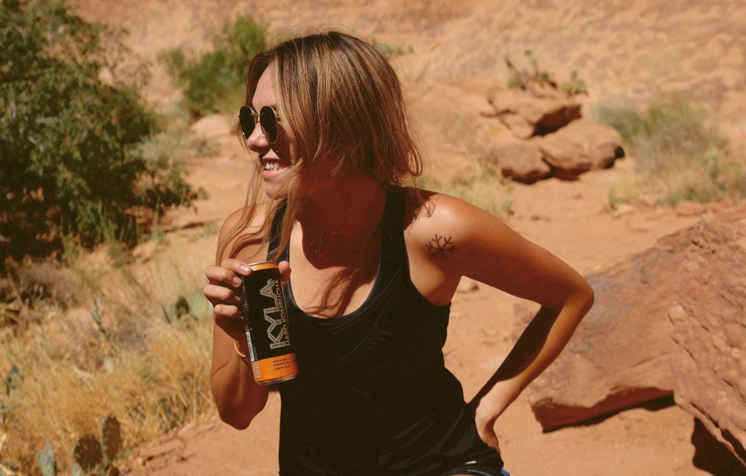 Drinking KYLA Kombucha in the Moab desert.