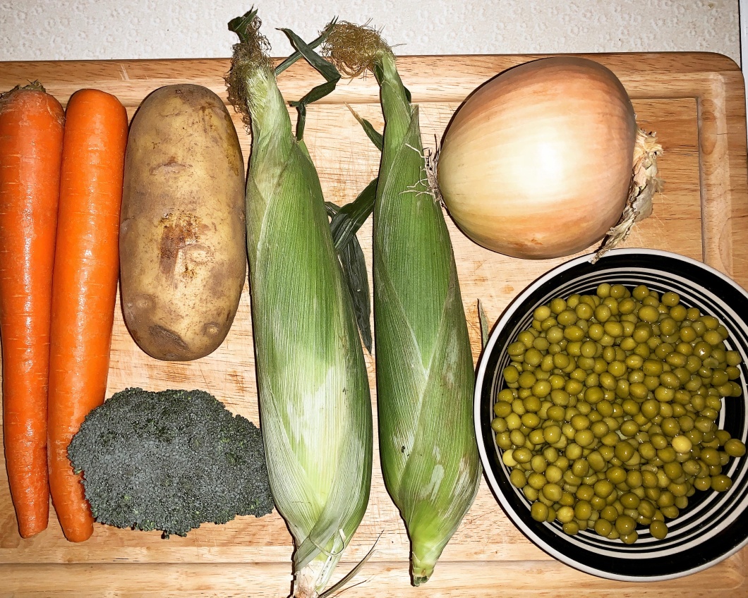corn, carrots, potatoes, onions, broccoli. peas